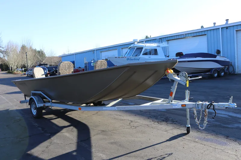 Slide: The Image of 2026 Smoker Craft Pro Sportsman 1866 boat on trailer in parking lot. - 20