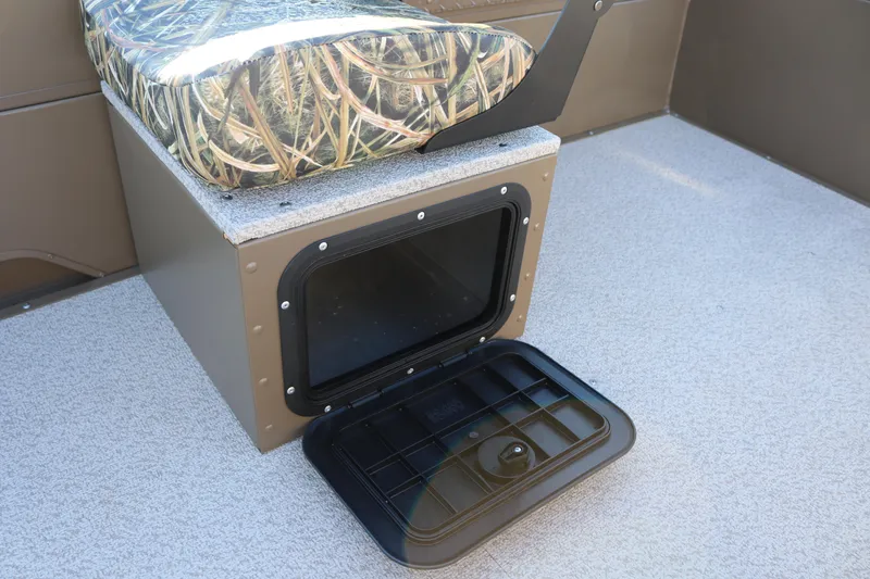 Slide: The Image of 2026 Smoker Craft Pro Sportsman 1866 boat seat with storage compartment open. - 5