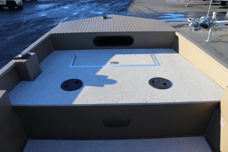 Slide: The Image of 2026 Smoker Craft Pro Sportsman 1866 boat deck with storage compartments. - 7