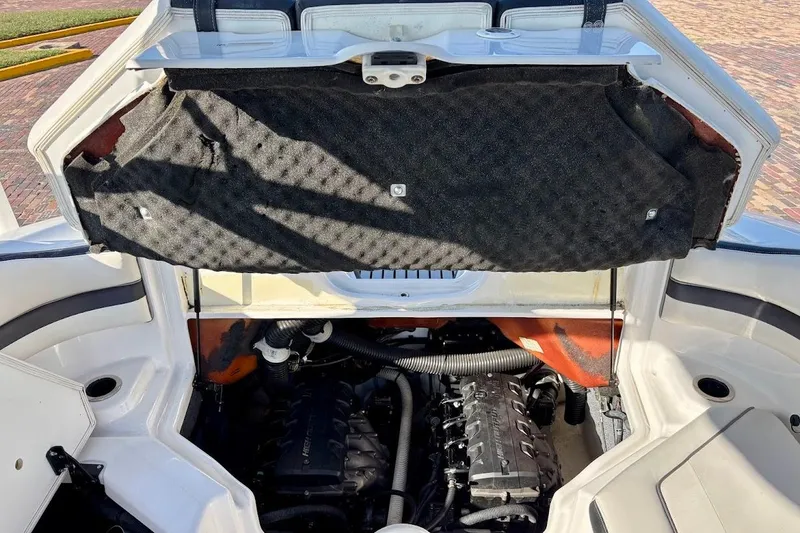 Slide: The Image of 2016 Yamaha Boats AR240 HO engine compartment with open hatch, showcasing dual engines. - 20