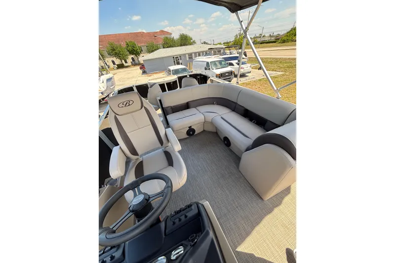 Slide: The Image of Interior of 2026 Bentley Pontoons Fish 243 4-Point with luxurious seating. - 11