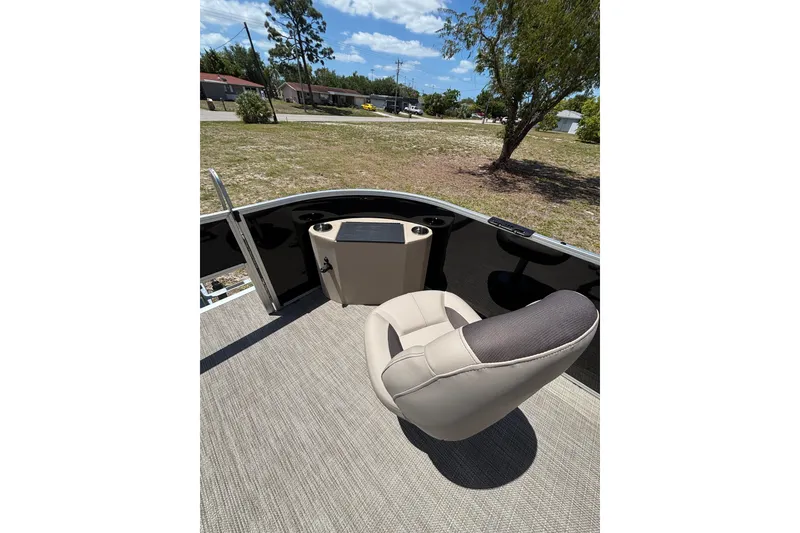 Slide: The Image of Interior of 2026 Bentley Pontoons Fish 243 4-Point with seat and helm. - 12
