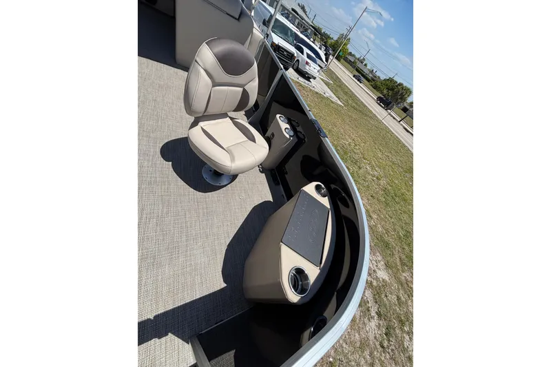 Slide: The Image of Interior of 2026 Bentley Pontoons Fish 243 4-Point with seat and console. - 13