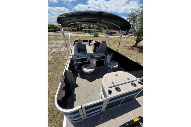 Slide: The Image of 2026 Bentley Pontoons Fish 243 4-Point with seating area and canopy. - 20