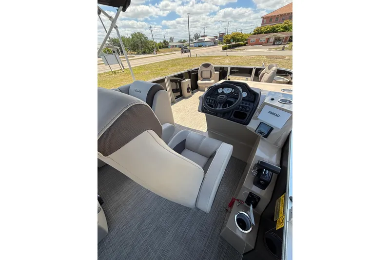 Slide: The Image of Interior of 2026 Bentley Pontoons Fish 243 4-Point with helm console. - 22