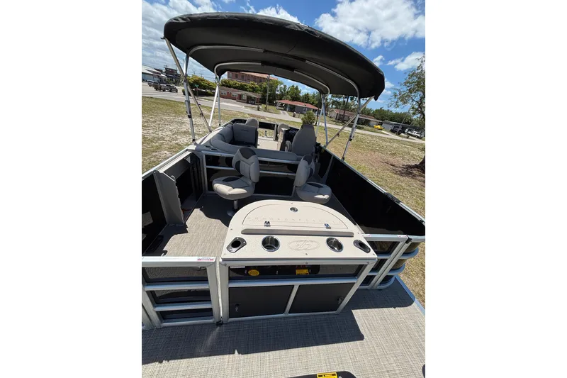 Slide: The Image of 2026 Bentley Pontoons Fish 243 4-Point with canopy and seating area. - 6