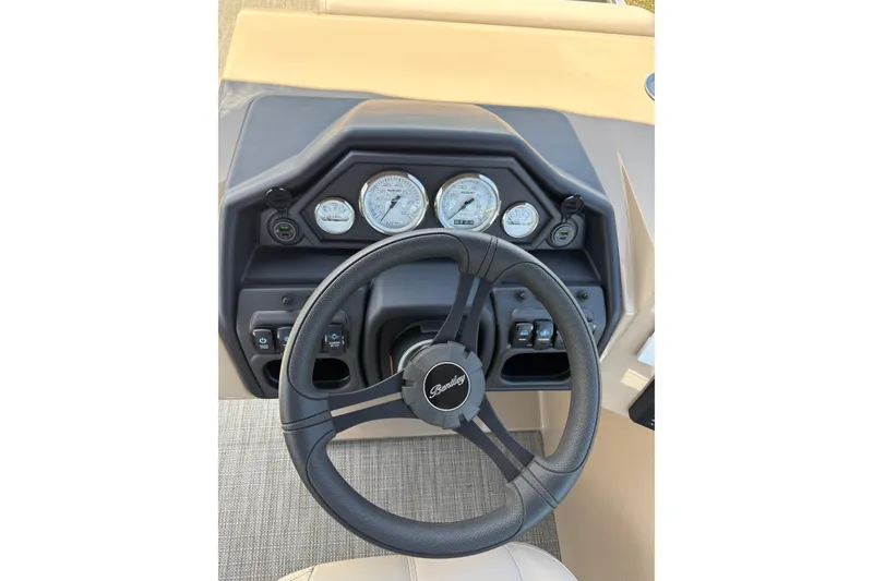 Slide: The Image of Steering wheel and dashboard of Bentley Pontoons Fish 243 4-Point 2026. - 7