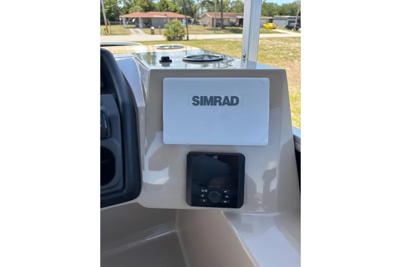 Slide: The Image of 2026 Bentley Pontoons Fish 243 console with Simrad display. - 8