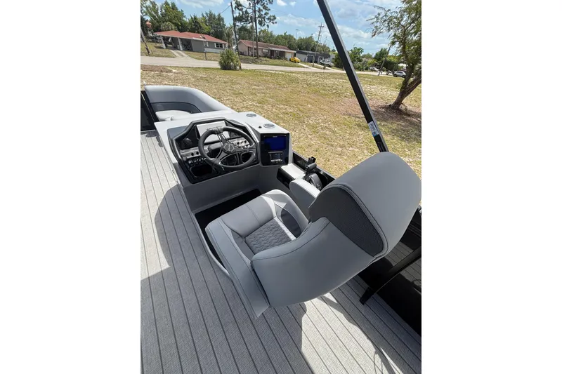 Slide: The Image of Interior of Bentley Pontoons Elite 253 Swingback 2026 with helm console. - 10