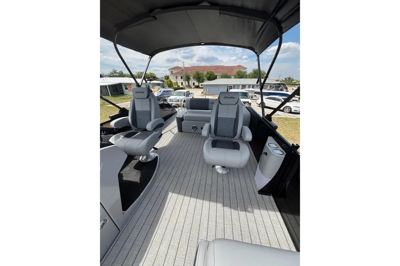 Slide: The Image of Interior of 2026 Bentley Pontoons Elite 253 Swingback with luxurious seating. - 7