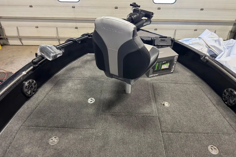Slide: The Image of 2026 Nitro ZV19 Sport Pro boat interior with Garmin equipment and seating. - 11