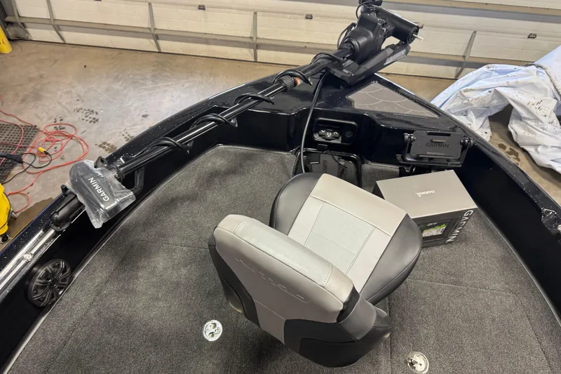 Slide: The Image of Interior of 2026 Nitro ZV19 Sport Pro boat with Garmin equipment and seating. - 13