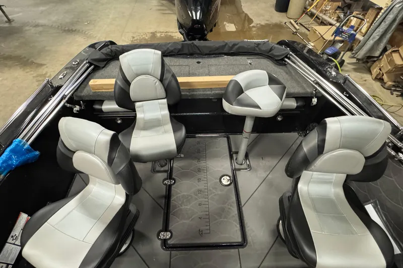 Slide: The Image of 2026 Nitro ZV19 Sport Pro boat interior with four gray and black seats. - 7
