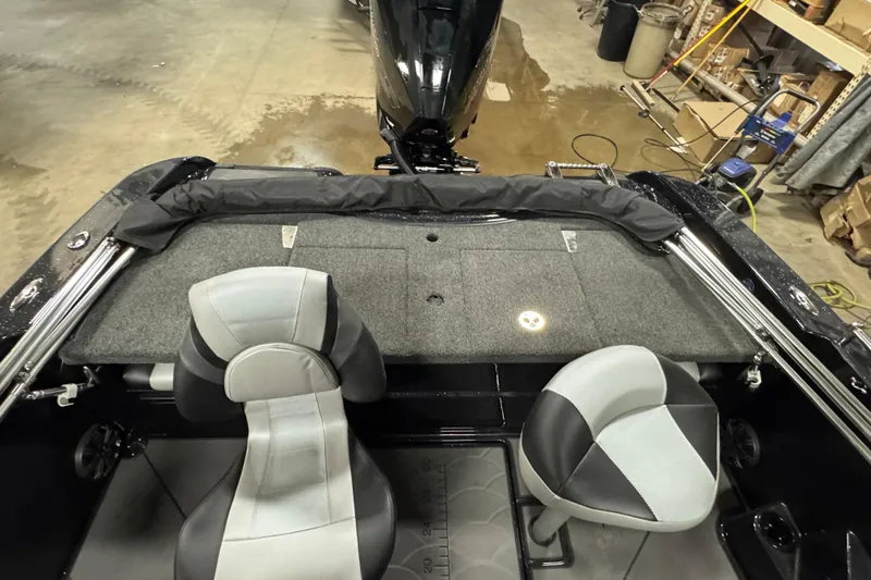 Slide: The Image of Interior view of 2026 Nitro ZV19 Sport Pro boat with seating and storage. - 8