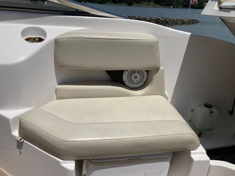 Slide: The Image of Seating area on a 2009 Regal 2450 Cuddy boat. - 14