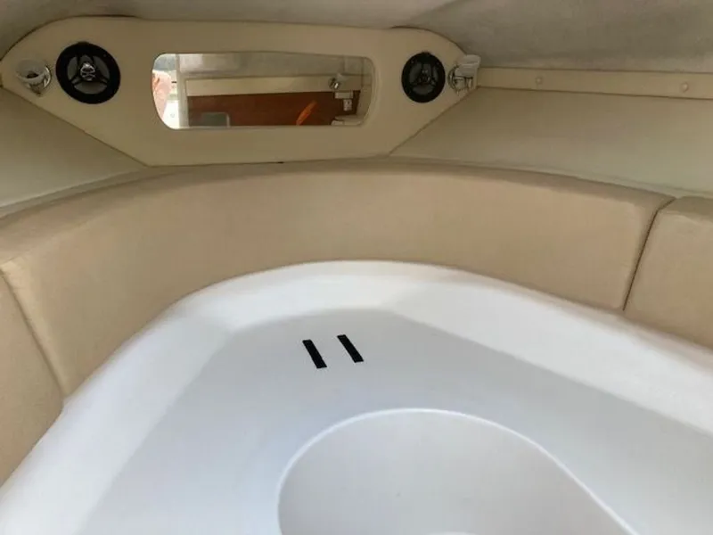 Slide: The Image of Interior of 2009 Regal 2450 Cuddy with speakers. - 21