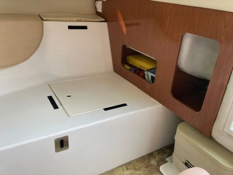 Slide: The Image of Interior of 2009 Regal 2450 Cuddy boat. - 28