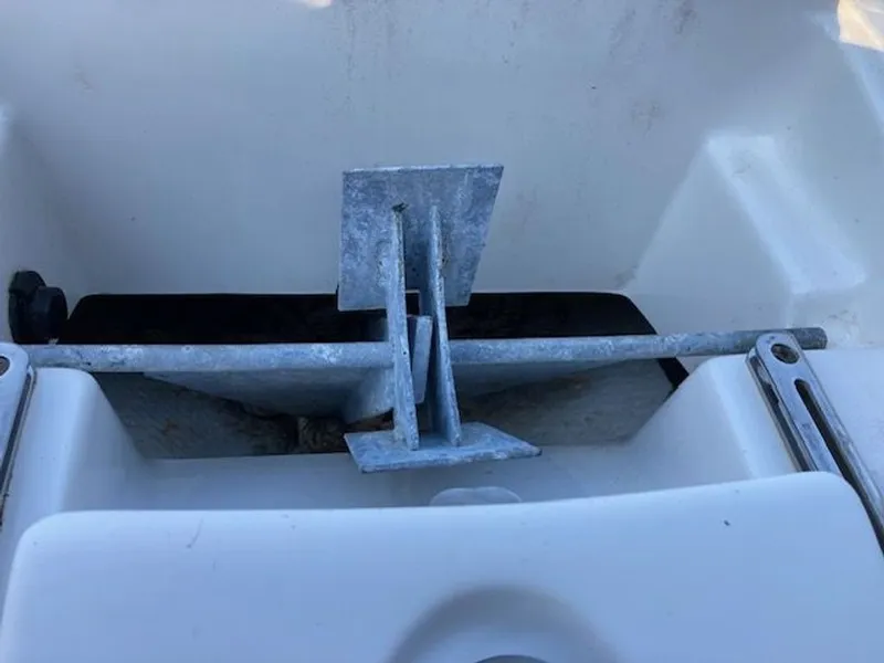 Slide: The Image of Anchor on a 2009 Regal 2450 Cuddy boat. - 30