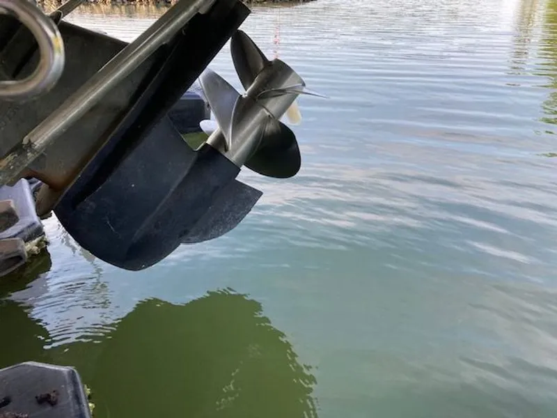 Slide: The Image of Close-up of a 2009 Regal 2450 Cuddy propeller in water. - 37