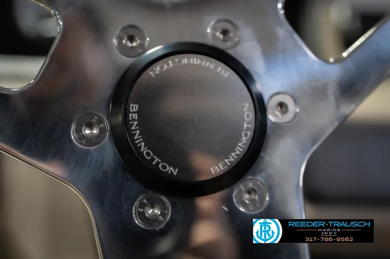 Slide: The Image of Close-up of 2026 Bennington 21 SLJ steering wheel with logo. - 29