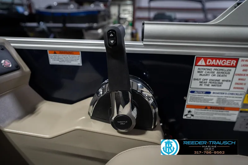 Slide: The Image of Throttle control of 2026 Bennington 21 SLJ boat with safety warnings visible. - 35