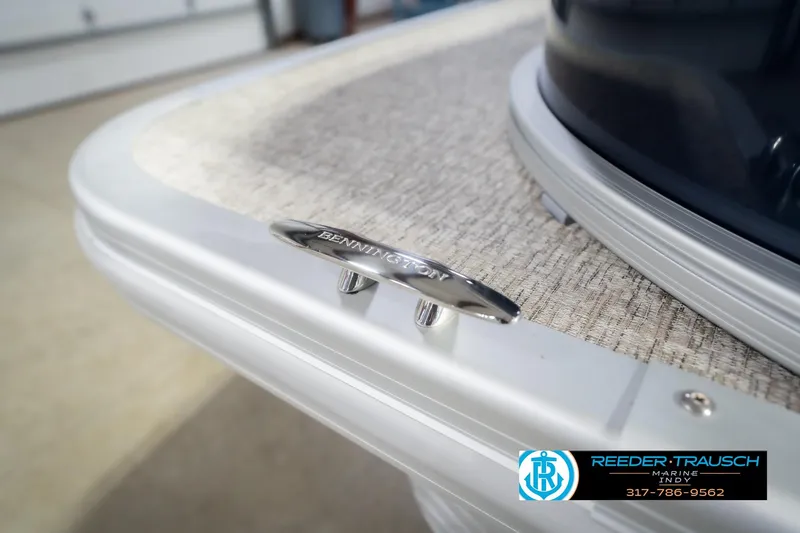 Slide: The Image of 2026 Bennington 21 SLJ boat cleat detail with Reeder-Trausch Marine logo. - 56