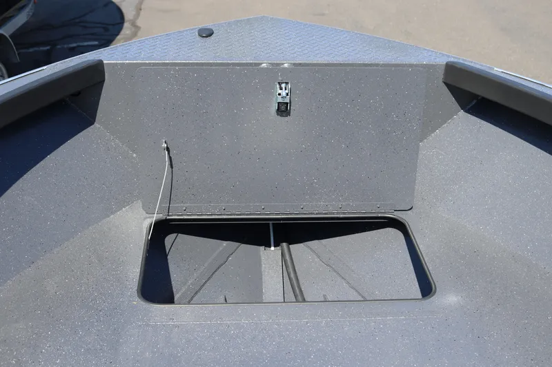 Slide: The Image of 2026 Alumaweld Adventurer 20 boat storage compartment, open and empty. - 10