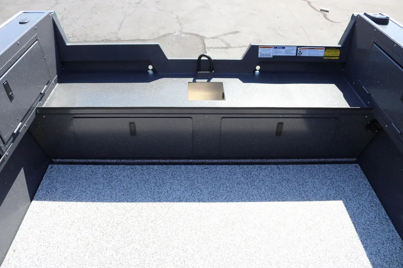 Slide: The Image of Interior of 2026 Alumaweld Adventurer 20 boat with storage compartments and sink. - 14