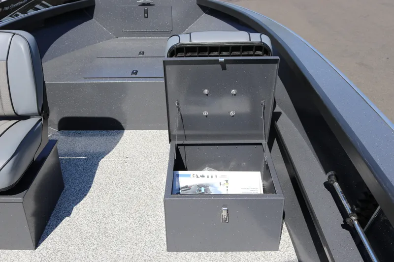 Slide: The Image of Open storage compartment in 2026 Alumaweld Adventurer 20 boat interior. - 6