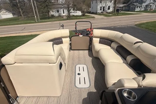 Slide: The Image of Luxurious 2021 Premier 250 Grand Majestic RF pontoon boat with spacious seating and elegant design. - 11