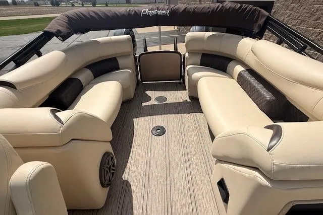 Slide: The Image of Luxurious 2021 Premier 250 Grand Majestic RF pontoon boat interior with plush seating. - 16