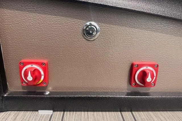 Slide: The Image of Red switches on a 2021 Premier 250 Grand Majestic RF boat panel. - 25