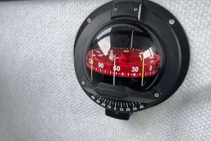 Slide: The Image of Compass on a textured surface, ACB model 30, year 2003. - 11