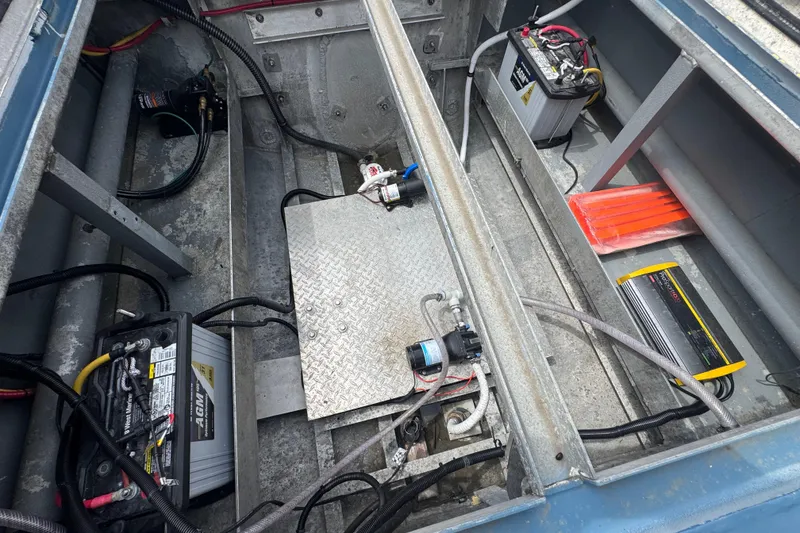 Slide: The Image of Boat engine compartment with batteries, wiring, and equipment, ACB 30 model, 2003. - 13