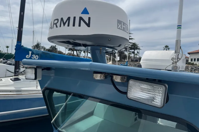Slide: The Image of Close-up of a 2003 ACB 30 boat with Garmin radar and lights. - 4