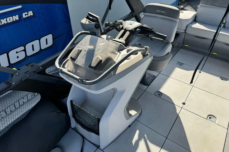 Slide: The Image of 2023 Sea-Doo Switch Cruise 21 interior with steering console and seating area. - 15