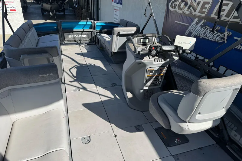 Slide: The Image of 2023 Sea-Doo Switch Cruise 21 interior with seating and control console. - 22