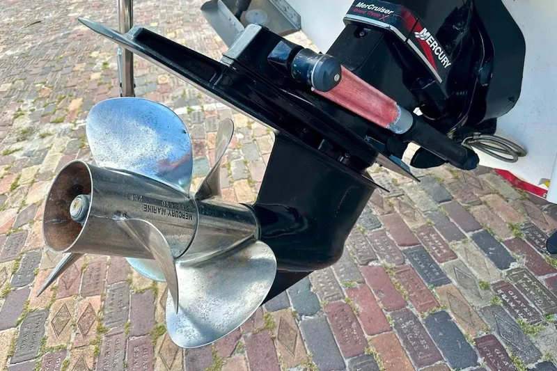 Slide: The Image of Propeller of a 2004 Sea Ray 270 Sundeck boat on a brick surface. - 13