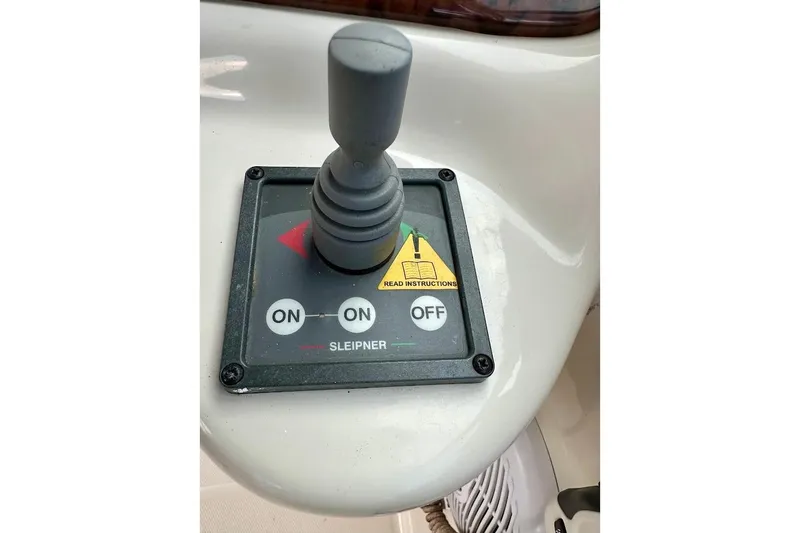 Slide: The Image of Joystick control panel on a 2004 Sea Ray 270 Sundeck boat. - 32