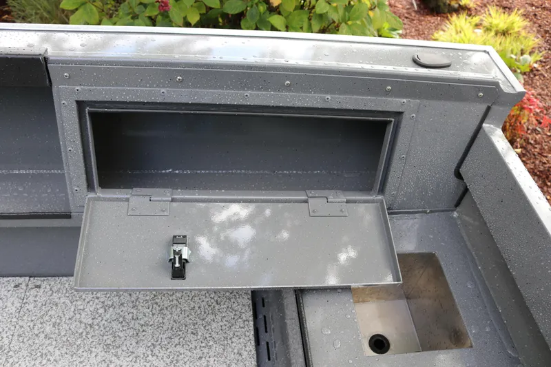 Slide: The Image of Alumaweld Free Drifter 18 (2026) boat storage compartment with open hatch. - 10