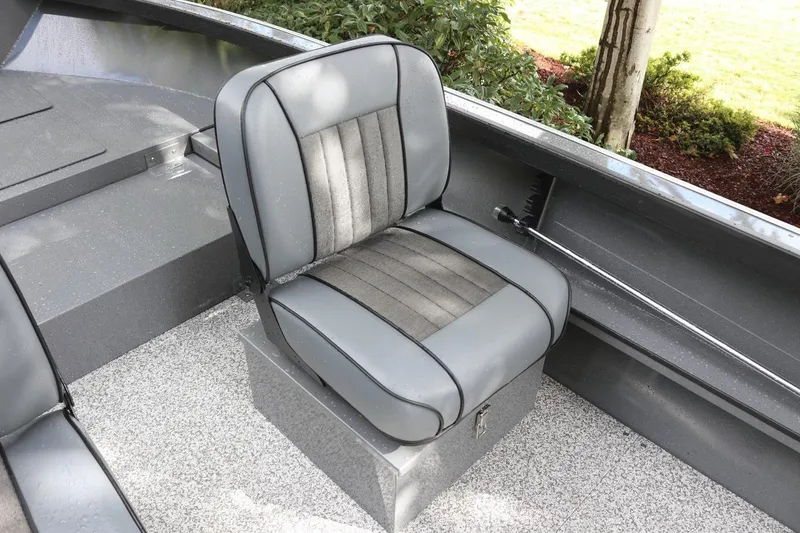 Slide: The Image of 2026 Alumaweld Free Drifter 18 boat interior with gray cushioned seat. - 11
