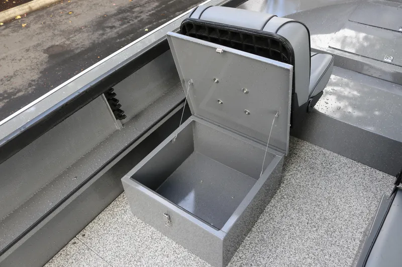 Slide: The Image of 2026 Alumaweld Free Drifter 18 boat interior with open storage compartment. - 12