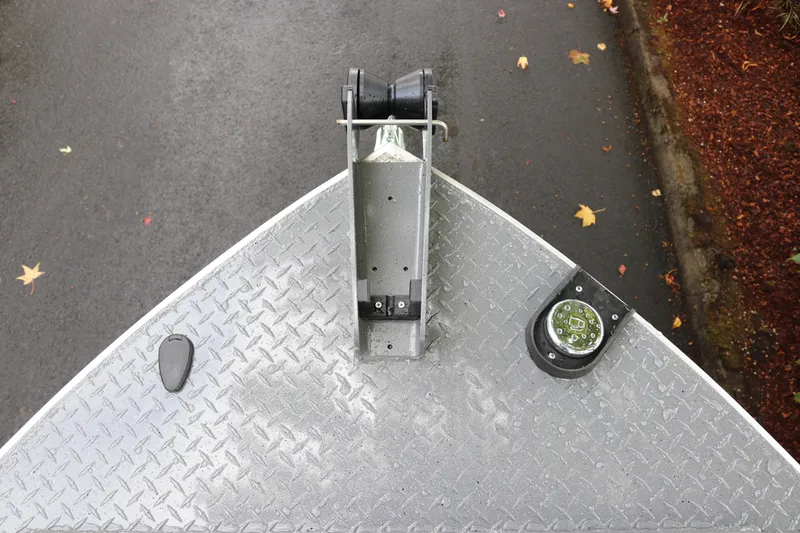 Slide: The Image of Bow of 2026 Alumaweld Free Drifter 18 boat with diamond plate surface. - 5