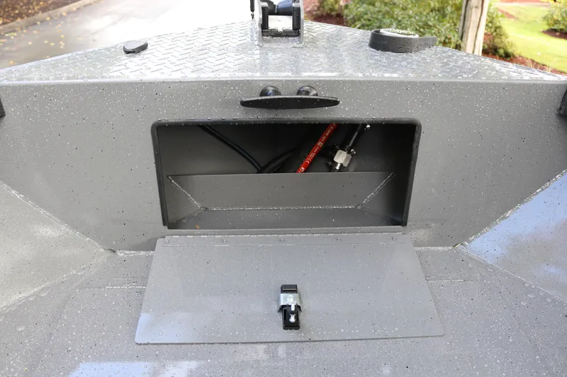Slide: The Image of Alumaweld Free Drifter 18 (2026) boat storage compartment with open hatch. - 8