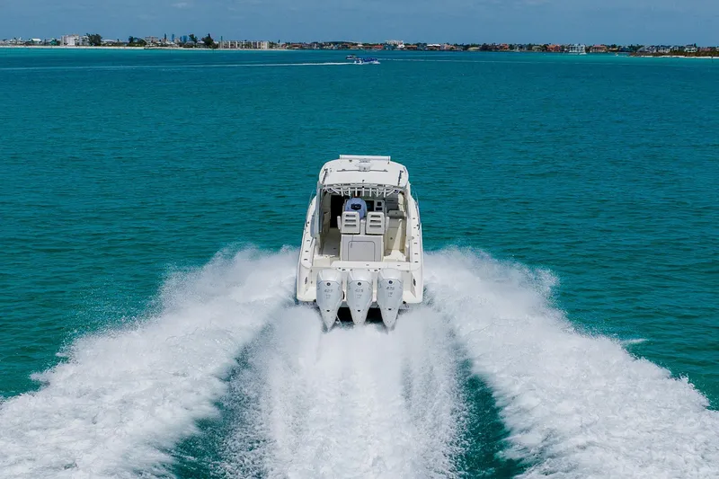 Slide: The Image of 2008 Hydra-Sports Vector 3500 VX speeding on open water, creating a wake. - 10