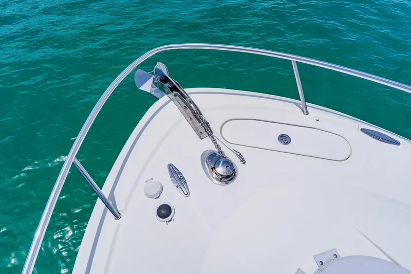 Slide: The Image of Bow of 2008 Hydra-Sports Vector 3500 VX boat with anchor, on clear blue water. - 12