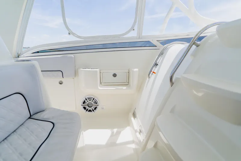 Slide: The Image of Interior of 2008 Hydra-Sports Vector 3500 VX boat, featuring white seating and sleek design. - 17