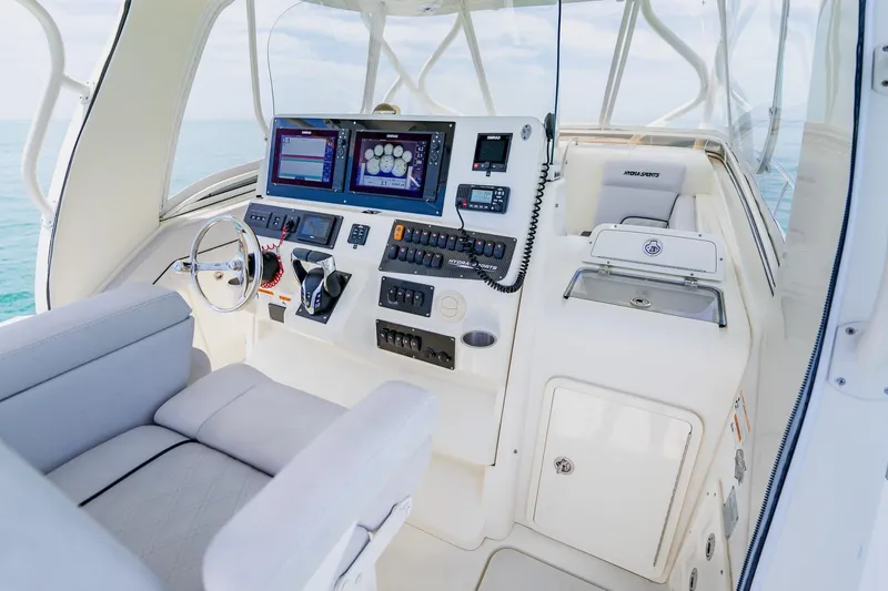 Slide: The Image of 2008 Hydra-Sports Vector 3500 VX boat cockpit with advanced navigation controls. - 24