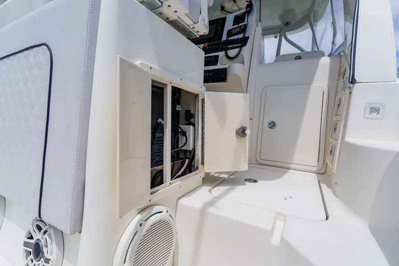 Slide: The Image of 2008 Hydra-Sports Vector 3500 VX boat interior with open storage compartment. - 27
