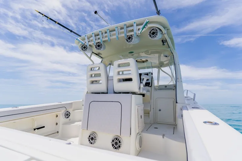 Slide: The Image of 2008 Hydra-Sports Vector 3500 VX boat interior with fishing rods and ocean view. - 35